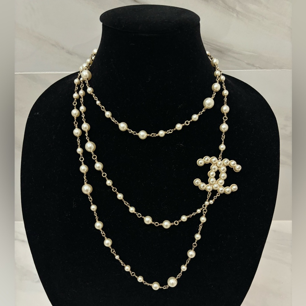 Chanel necklace.